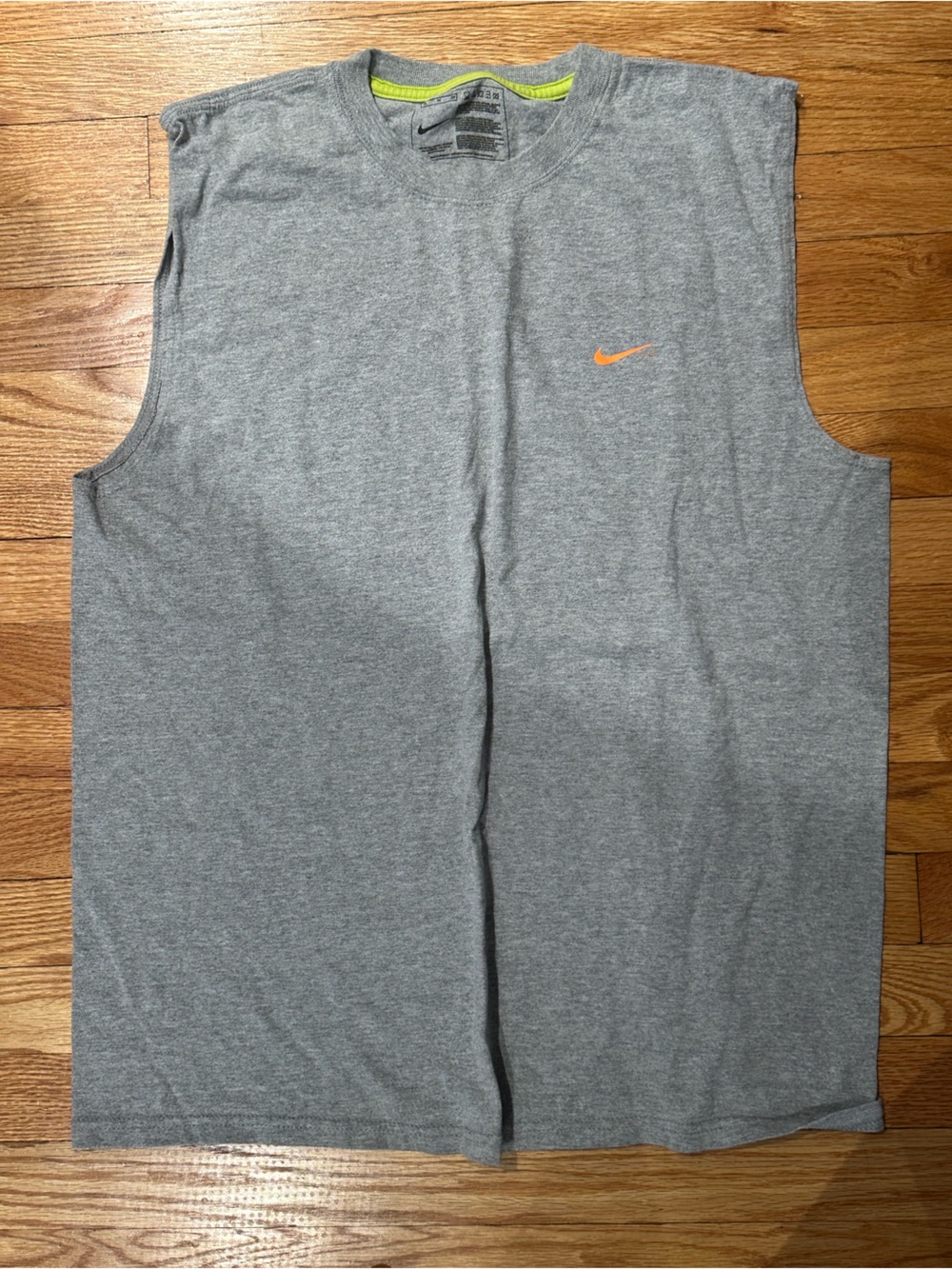 Nike Gray Sleeveless Athletic Shirt with Orange Swoosh